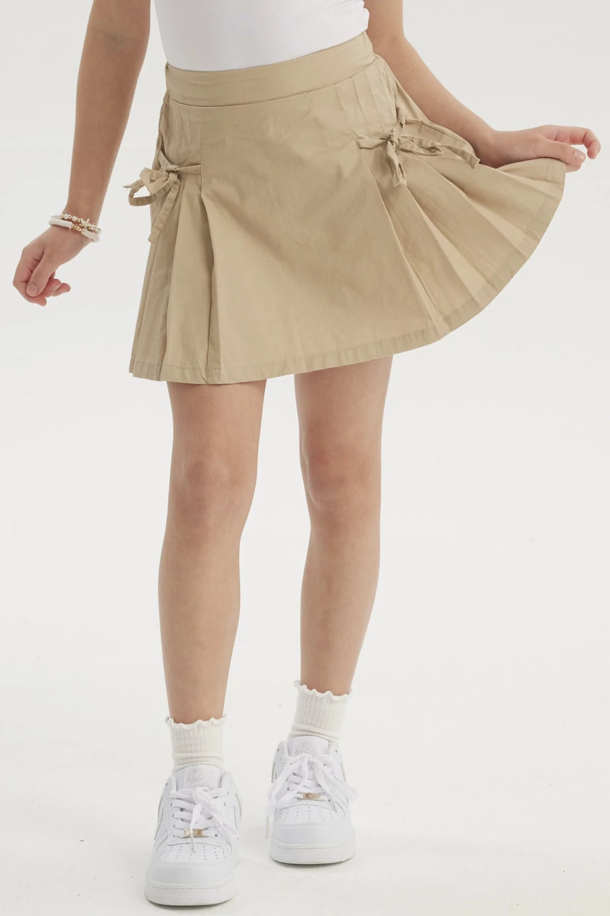 Falda Niña Pliegues Laterales Beige